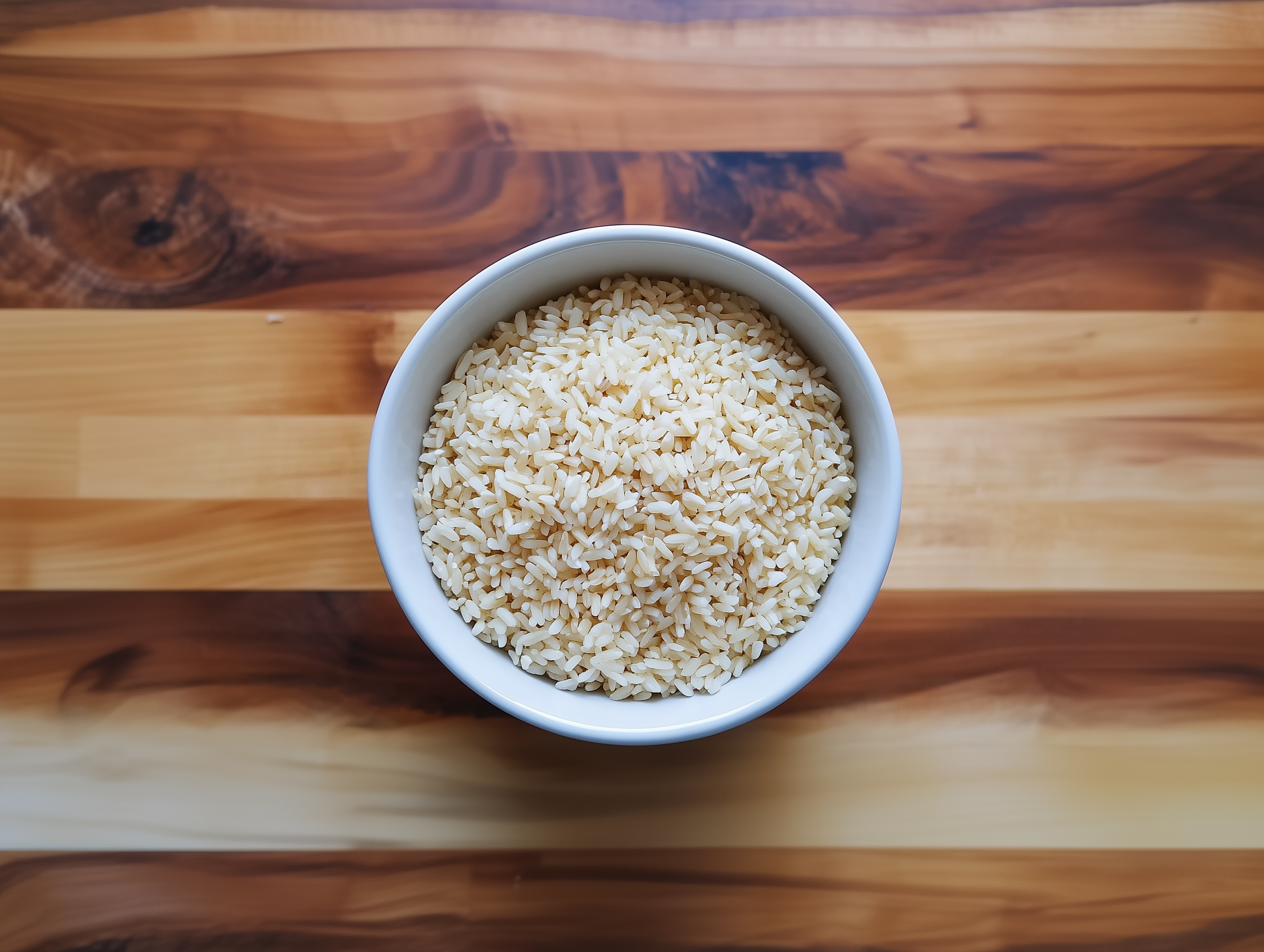 u8192637169_A_bowl_with_full_of_rice_at_the_middle_of_a_wooden__6c8323ff-5342-4fc5-b826-8962847efda7.png